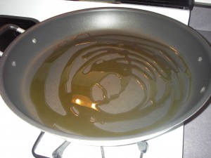 Olive oil in pan for tortilla espanola recipe