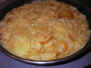 Tortilla Espanola potatoes, onions, and eggs mixed